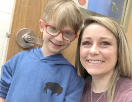 Melanie Aromola-Grandits with a Student